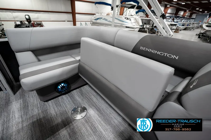 Slide: The Image of 2025 Bennington 118 SLS boat interior with gray seating and modern design. - 24