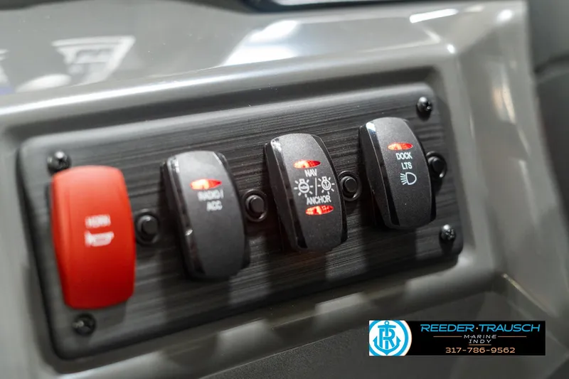 Slide: The Image of Control panel of 2025 Bennington 118 SLS boat with labeled switches. - 30