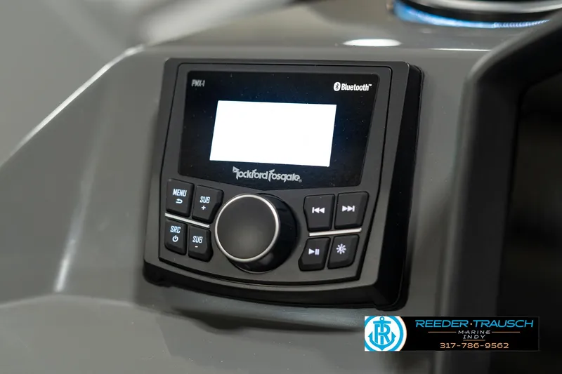 Slide: The Image of Rockford Fosgate Bluetooth stereo on 2025 Bennington 118 SLS boat dashboard. - 31