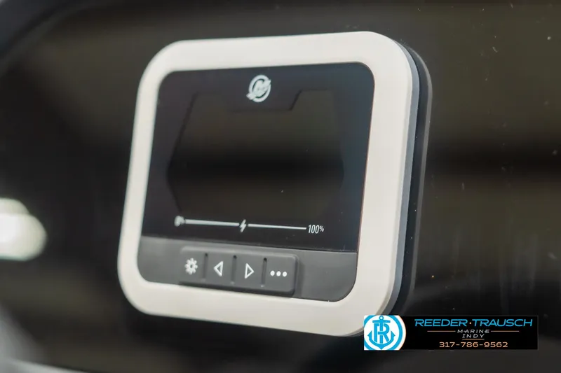 Slide: The Image of 2025 Bennington 118 SLS control panel with digital display and buttons. - 32