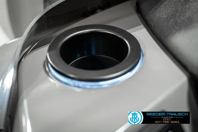 Slide: The Image of 2025 Bennington 118 SLS cup holder detail with sleek design. - 38