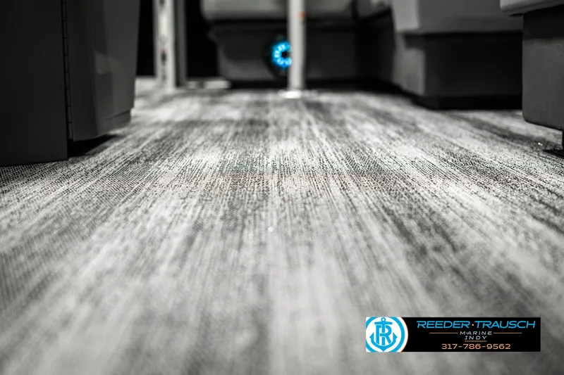 Slide: The Image of Interior flooring of 2025 Bennington 118 SLS boat, featuring modern design and texture. - 42