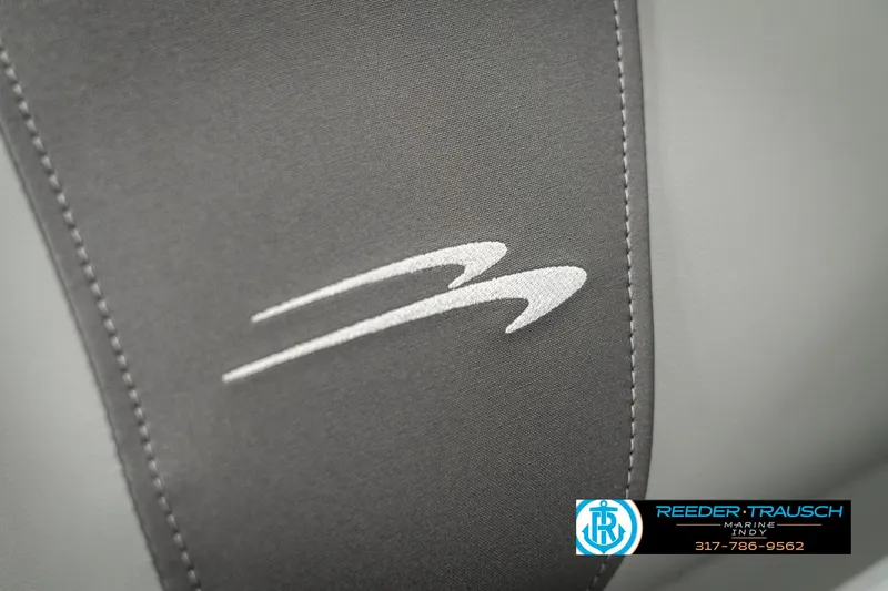 Slide: The Image of Close-up of 2025 Bennington 118 SLS logo on gray fabric. - 43