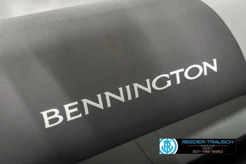 Slide: The Image of 2025 Bennington 118 SLS boat seat with logo, Reeder-Trausch branding visible. - 44