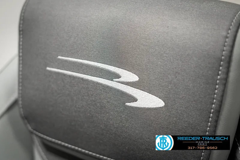 Slide: The Image of 2025 Bennington 118 SLS seat with logo, featuring Reeder-Trausch Marine branding. - 45