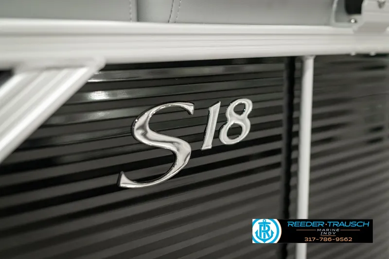Slide: The Image of Close-up of 2025 Bennington 118 SLS boat model emblem. - 49
