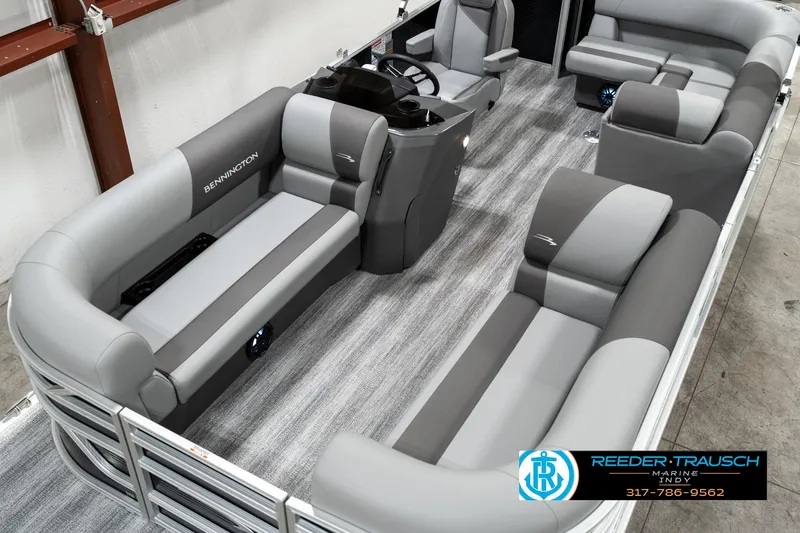 Slide: The Image of 2025 Bennington 118 SLS pontoon boat interior with gray seating and modern design. - 9