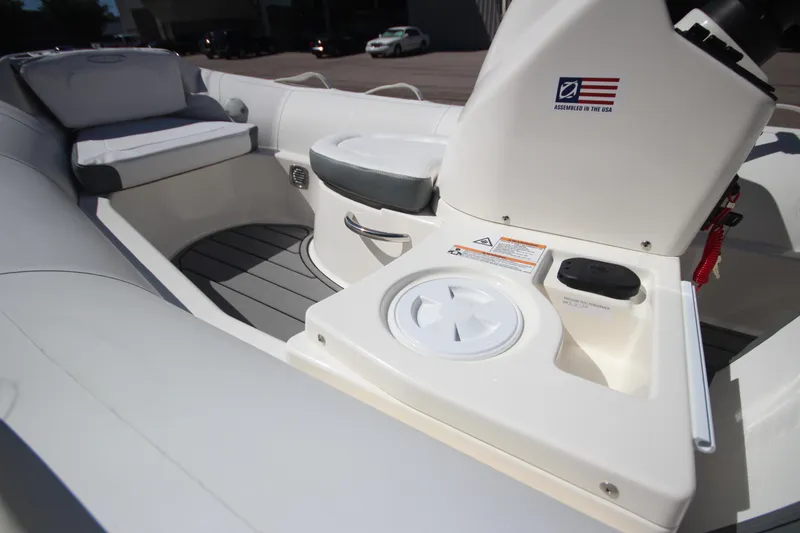 Slide: The Image of 2025 Zodiac Yachtline 400 DL NEO, sleek interior, modern design, 50hp engine, in stock. - 9