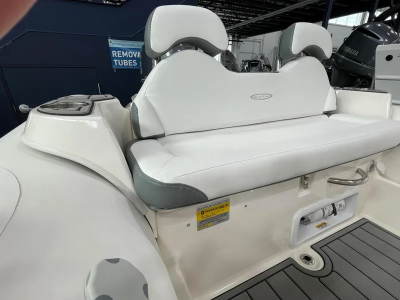 Slide: The Image of 2025 Zodiac Yachtline 490 Deluxe NEO 90hp, white seating, sleek design, in stock. - 30