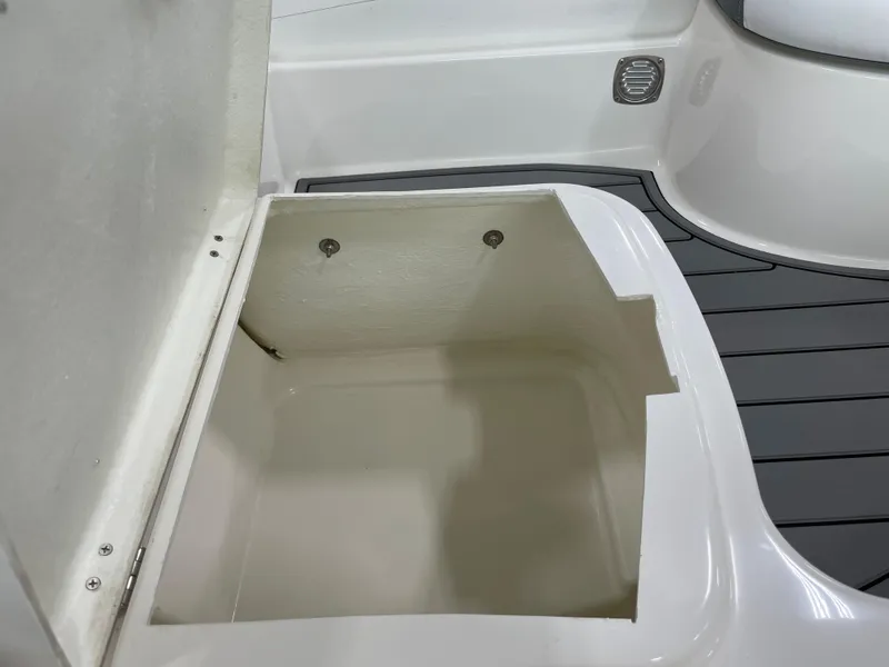 Slide: The Image of Open storage compartment on 2025 Zodiac Yachtline 490 Deluxe NEO boat. - 31