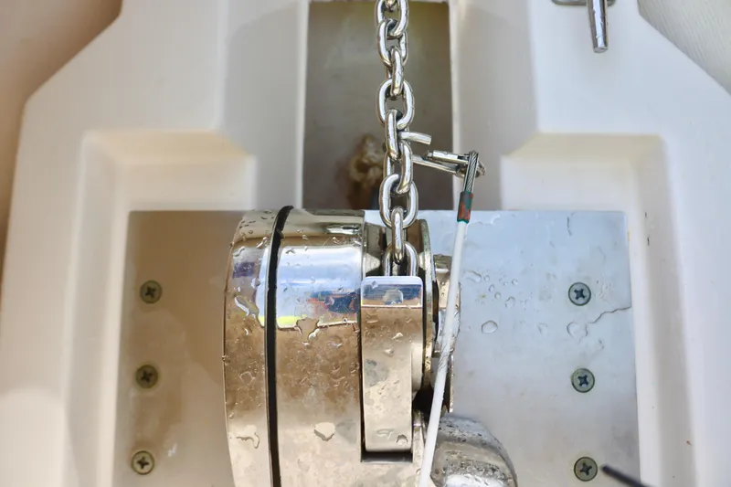 Slide: The Image of Anchor chain mechanism on a 2017 Pursuit DC 295 Dual Console boat. - 14