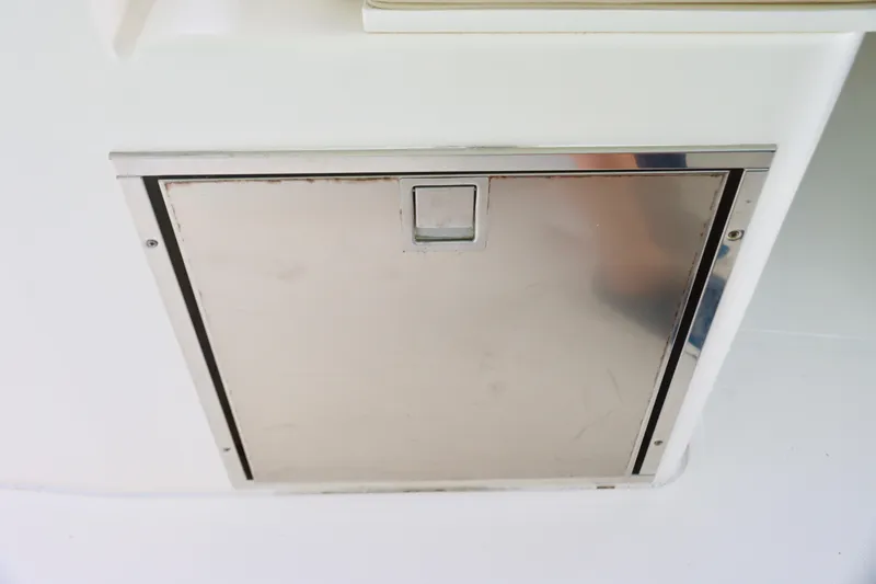 Slide: The Image of Stainless steel hatch on 2017 Pursuit DC 295 Dual Console boat. - 16