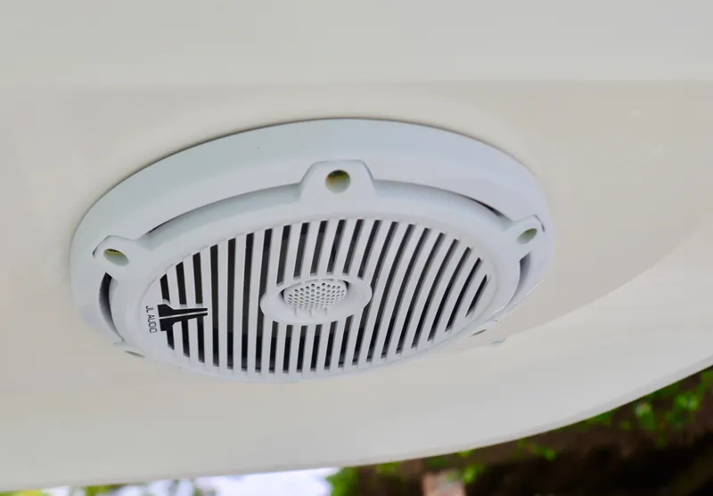 Slide: The Image of Close-up of a speaker on a 2017 Pursuit DC 295 Dual Console boat. - 20