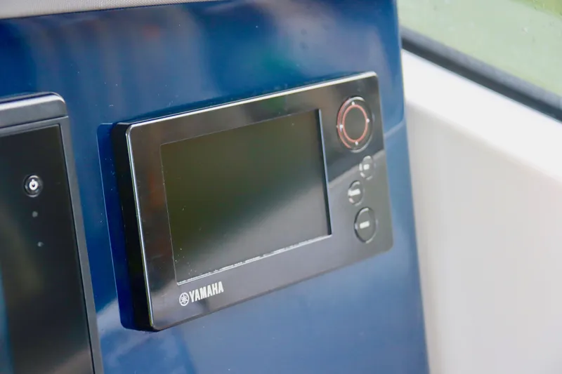 Slide: The Image of Yamaha display panel on 2017 Pursuit DC 295 Dual Console boat. - 5