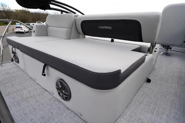 Slide: The Image of 2025 Harris 230 Cruiser boat with spacious seating and modern design. - 15