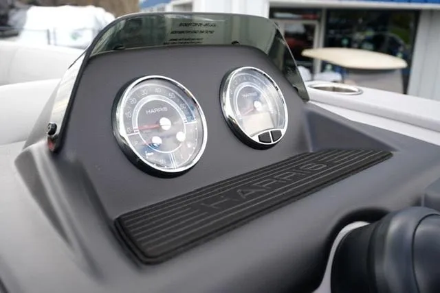 Slide: The Image of Dashboard of 2025 Harris 230 Cruiser boat with gauges and controls. - 16