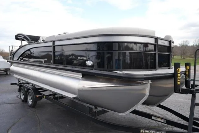 Slide: The Image of 2025 Harris 230 CRUISER pontoon boat on trailer, sleek black design. - 6