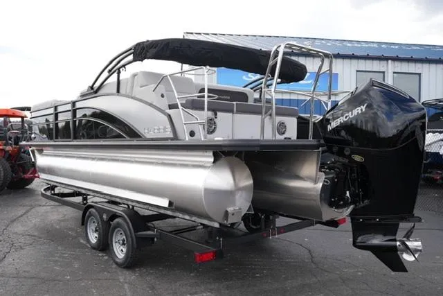 Slide: The Image of 2025 Harris 230 CRUISER pontoon boat on trailer, featuring Mercury outboard motor. - 8