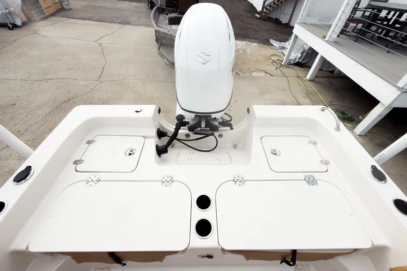 Slide: The Image of 2025 Carolina Skiff 21 Ultra Elite boat with outboard motor, viewed from above. - 18