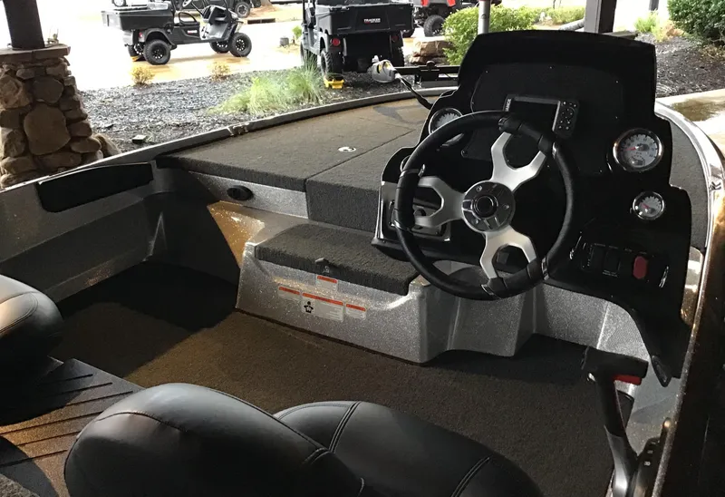 Slide: The Image of Interior of 2025 Nitro Z17 boat with steering wheel and dashboard. - 3