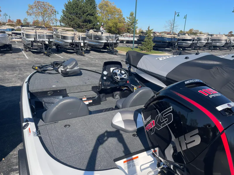 Slide: The Image of 2025 Nitro Z17 boat with Mercury engine in a marina setting. - 5