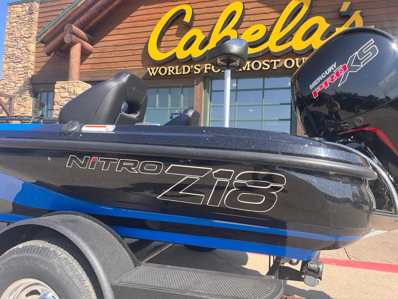 Slide: The Image of 2025 Nitro Z18 boat at Cabela's store, featuring Mercury Pro XS engine. - 5
