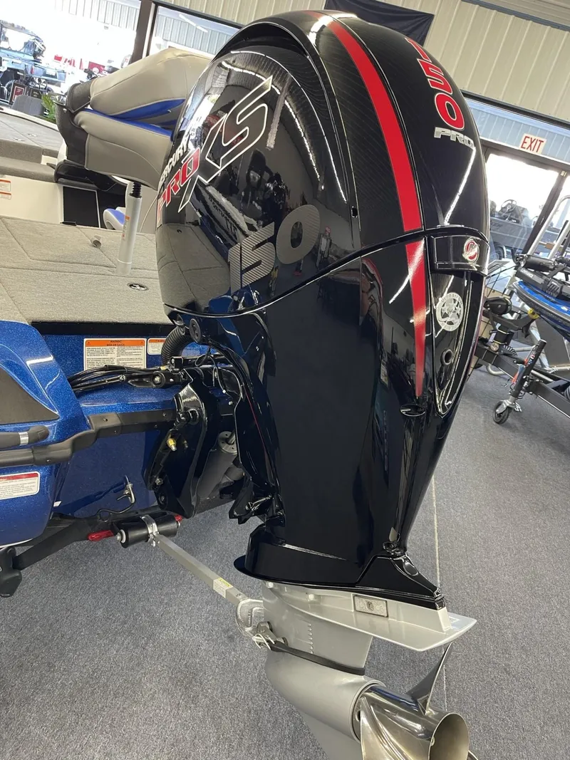 Slide: The Image of 2025 Nitro Z18 boat with a powerful 150 HP outboard motor in showroom. - 3