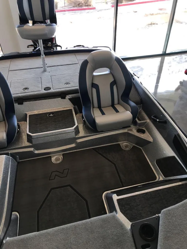 Slide: The Image of 2025 Nitro Z21 XL boat interior with sleek seating and modern design. - 6