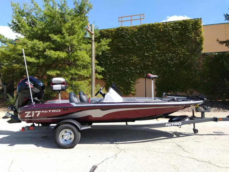The Image of 2025 Nitro Z17 boat on trailer, parked outdoors, side view. - 0