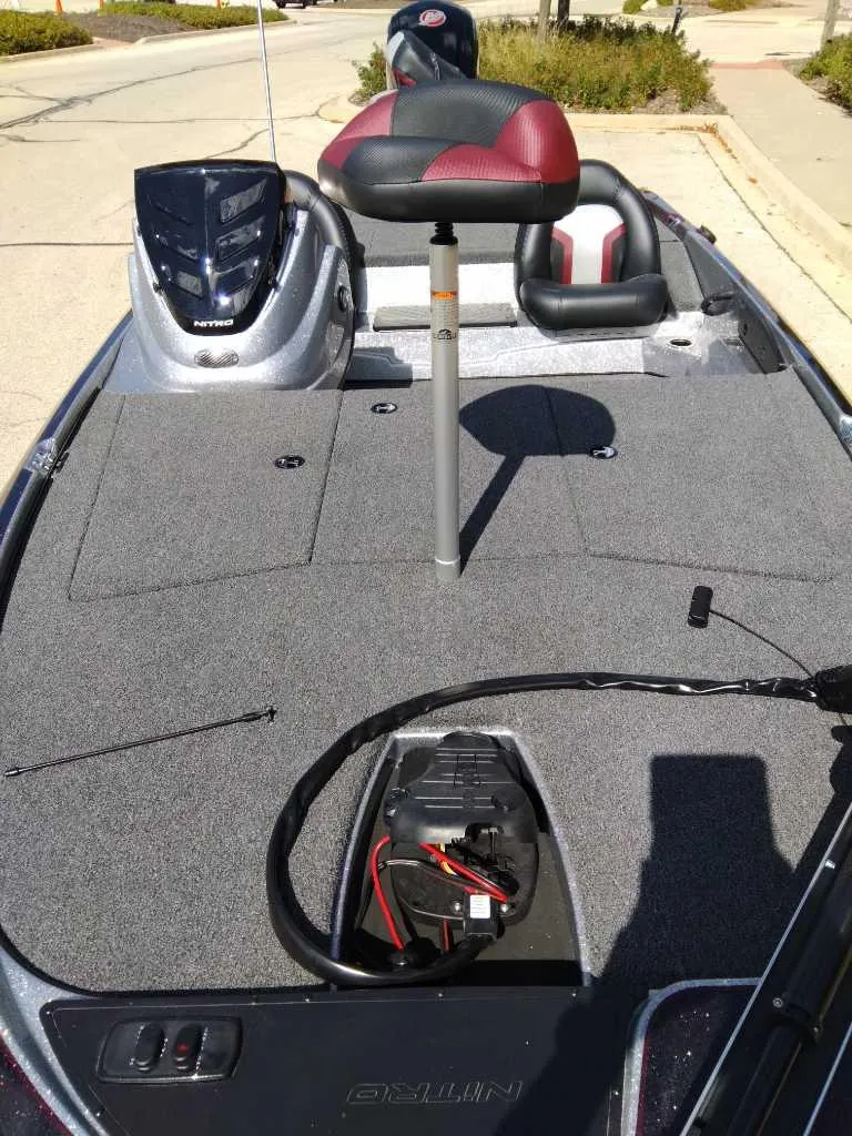 Slide: The Image of 2025 Nitro Z17 fishing boat deck with seat and control panel. - 1