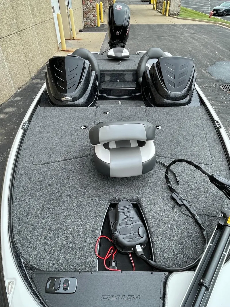 Slide: The Image of 2025 Nitro Z17 fishing boat with dual seats and trolling motor on deck. - 1