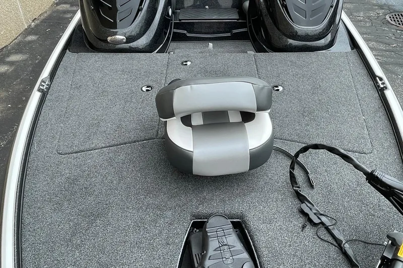 Slide: The Image of 2025 Nitro Z17 boat deck with gray carpet and adjustable seat. - 67