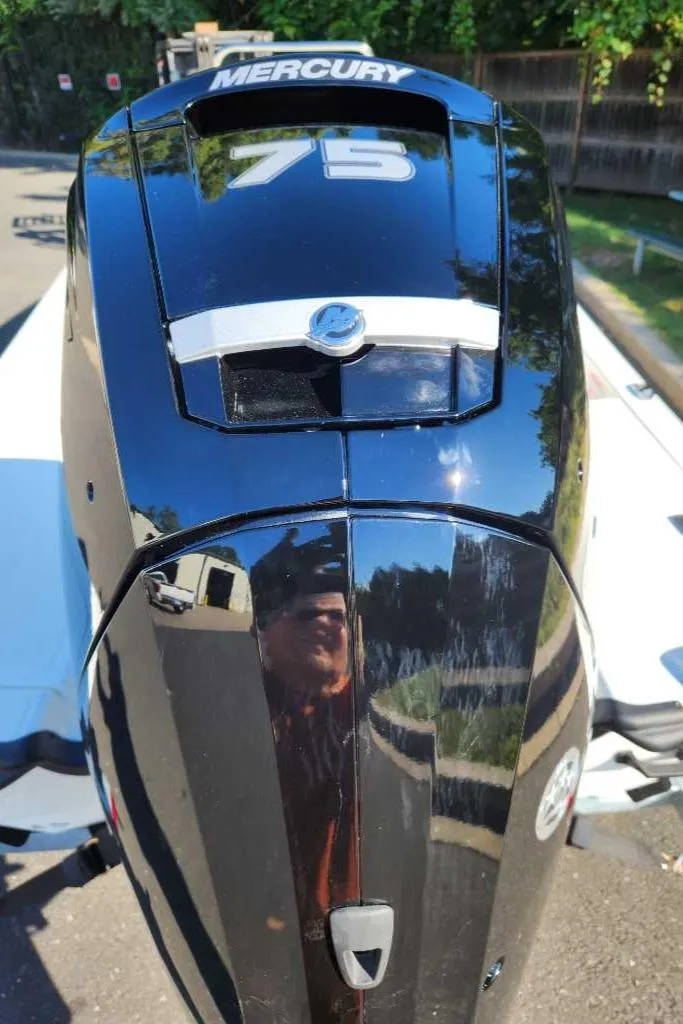 Slide: The Image of Mercury 75 outboard motor on 2025 Mako Pro Skiff 17 CC boat. - 3