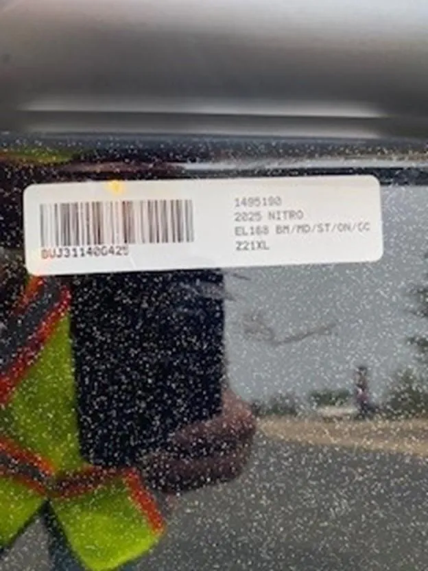 Slide: The Image of 2025 Nitro Z21 XL boat label with barcode and specifications. - 14