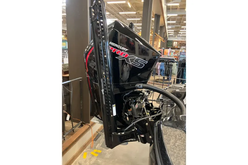 Slide: The Image of 2025 Nitro Z21 XL Pro boat with Mercury Pro XS engine in showroom. - 12
