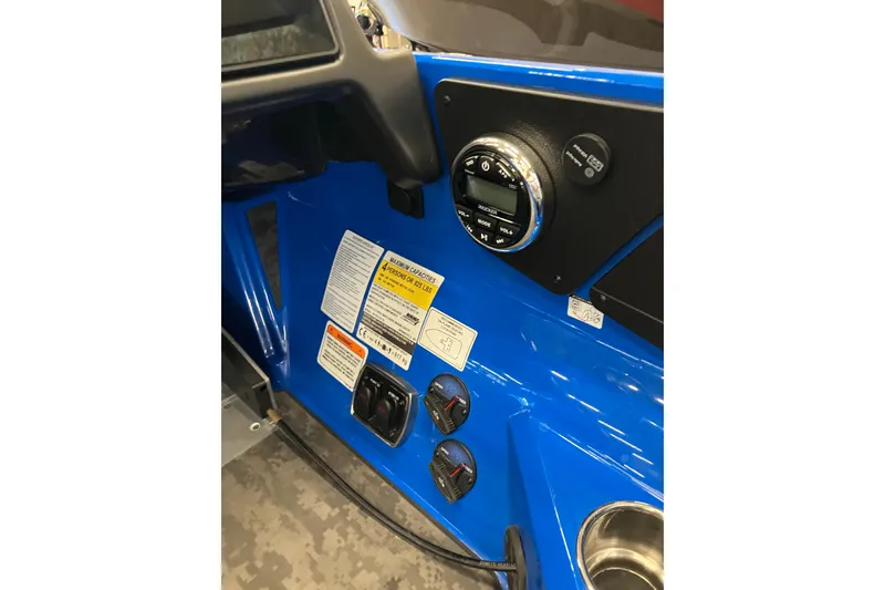 Slide: The Image of 2025 Nitro Z21 XL Pro dashboard with controls and gauges in blue interior. - 5