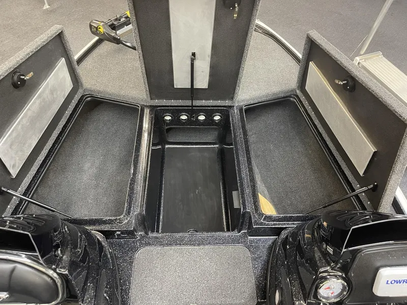 Slide: The Image of 2025 Nitro Z17 boat storage compartments with open lids, showcasing spacious interior design. - 12