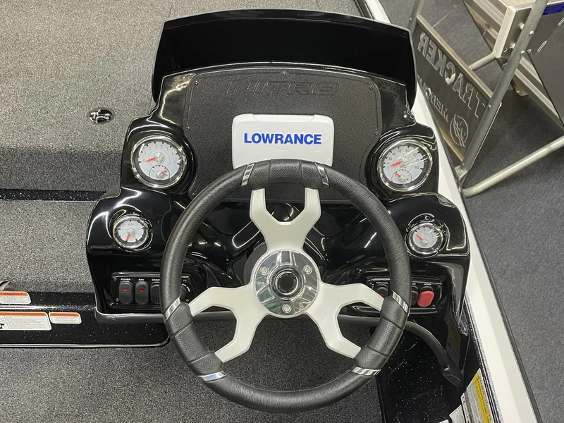 Slide: The Image of Steering console of 2025 Nitro Z17 boat with Lowrance display and gauges. - 16