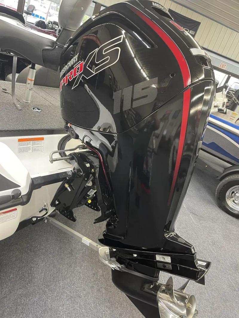 Slide: The Image of Nitro Z17 2025 boat with powerful Pro XS 115 outboard motor in showroom. - 4