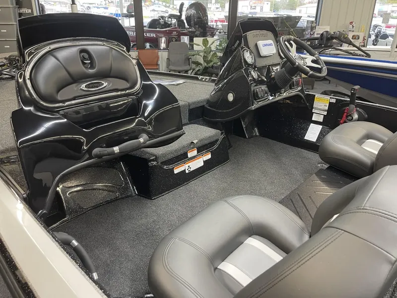 Slide: The Image of Interior of 2025 Nitro Z17 boat with sleek seating and modern dashboard. - 6