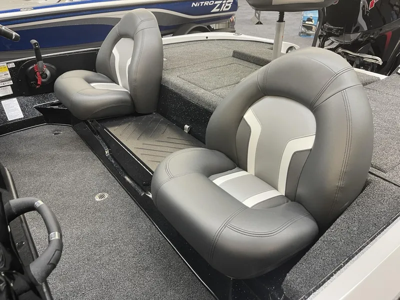 Slide: The Image of 2025 Nitro Z17 boat interior with gray cushioned seats. - 7