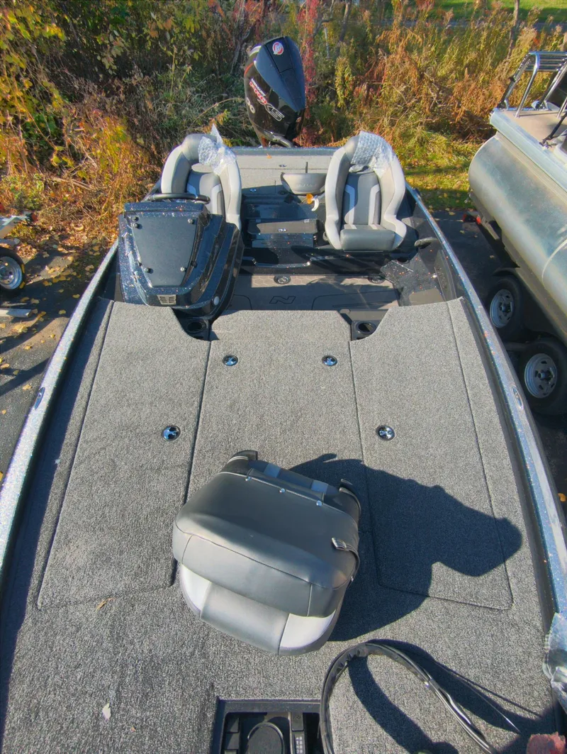 Slide: The Image of 2025 Nitro Z19 Pro fishing boat with spacious deck and seating. - 3