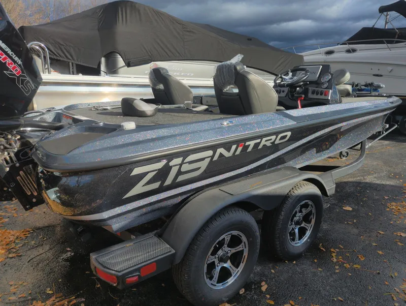 Slide: The Image of 2025 Nitro Z19 Pro boat on trailer, parked outdoors. - 4