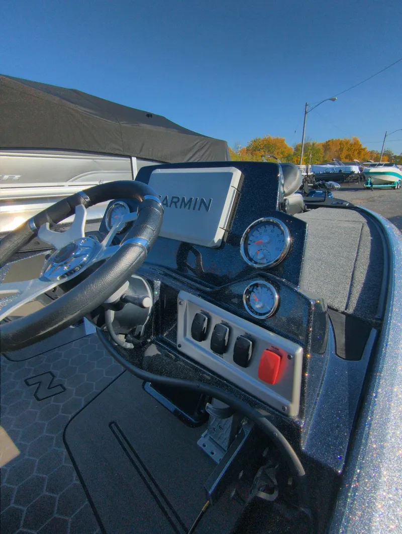 Slide: The Image of 2025 Nitro Z19 Pro boat dashboard with Garmin navigation system. - 6