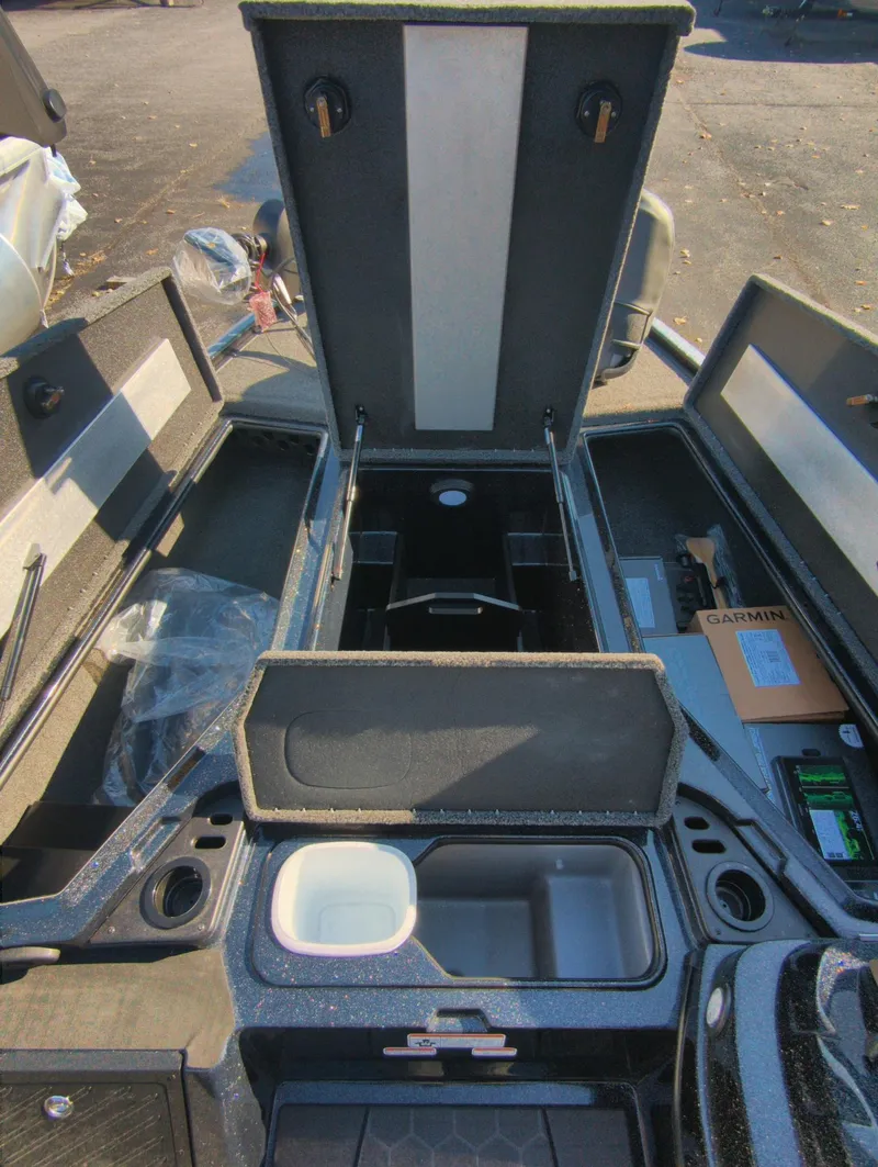 Slide: The Image of 2025 Nitro Z19 Pro boat storage compartments open, showcasing organized interior layout. - 8