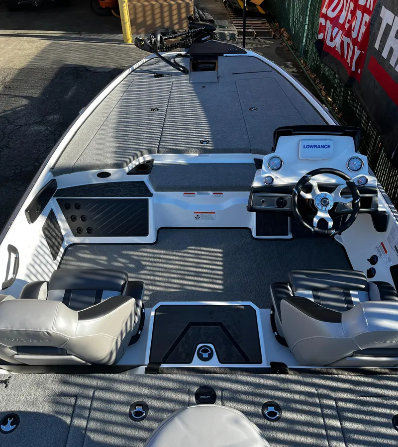 Slide: The Image of 2025 Nitro Z20 XL boat interior with modern dashboard and seating. - 5