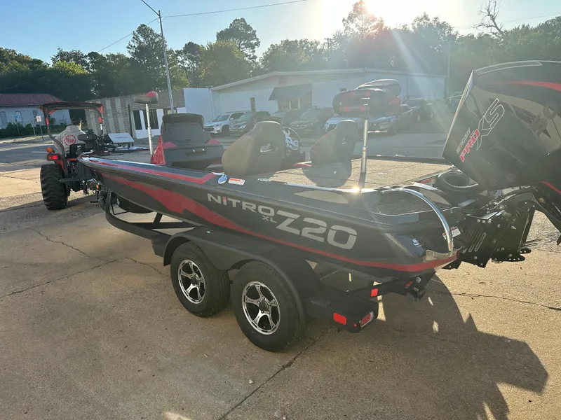 Slide: The Image of 2025 Nitro Z20 XL Pro boat on trailer in sunny outdoor setting. - 3