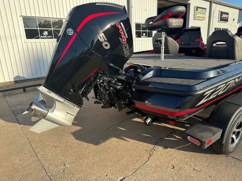 Slide: The Image of 2025 Nitro Z20 XL Pro boat with powerful outboard motor in a sunny outdoor setting. - 4