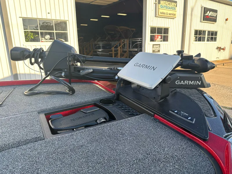 Slide: The Image of 2025 Nitro Z20 XL Pro boat with Garmin equipment at a dealership. - 5