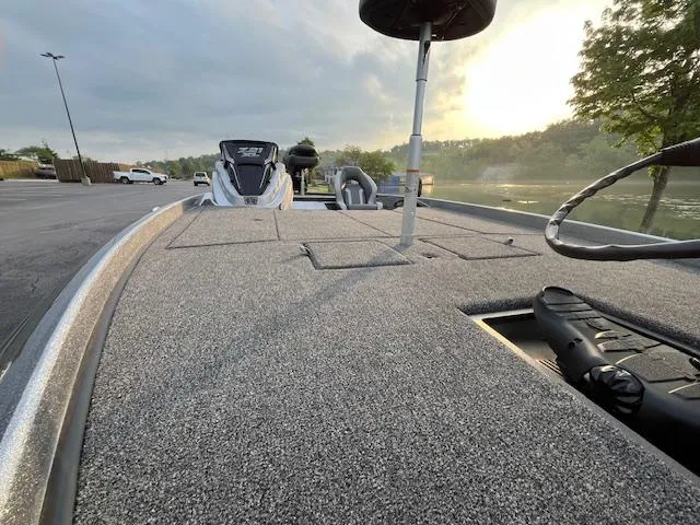 Slide: The Image of 2025 Nitro Z21 XL boat on trailer in parking lot. - 8